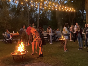 People gathered around bonfire